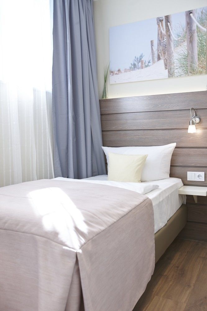 By Golden Tulip Hotel
